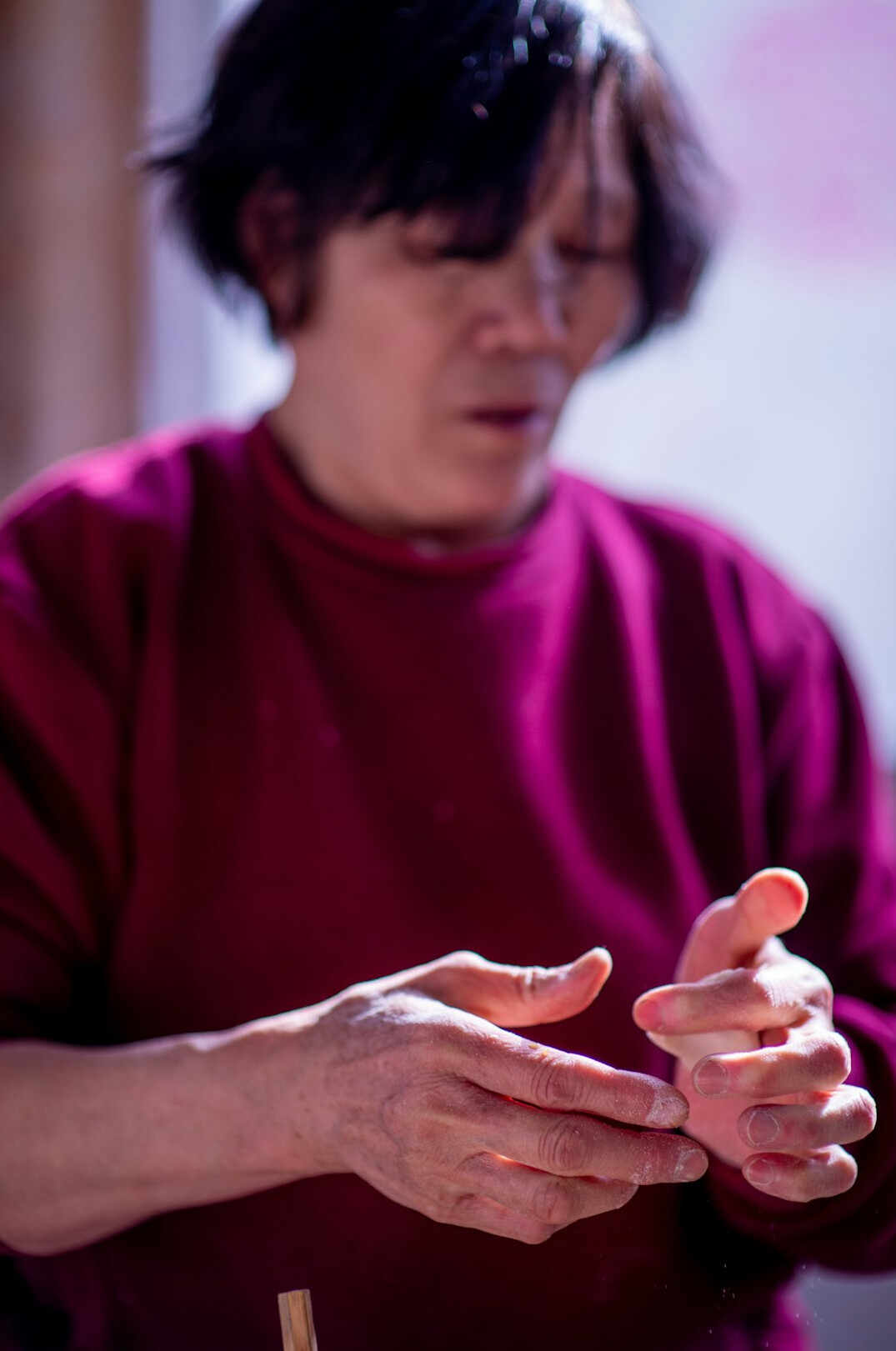 Studio portrait of a Japanese male data science instructor