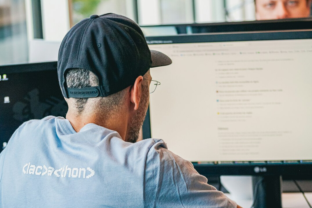 bilingual coder at computer